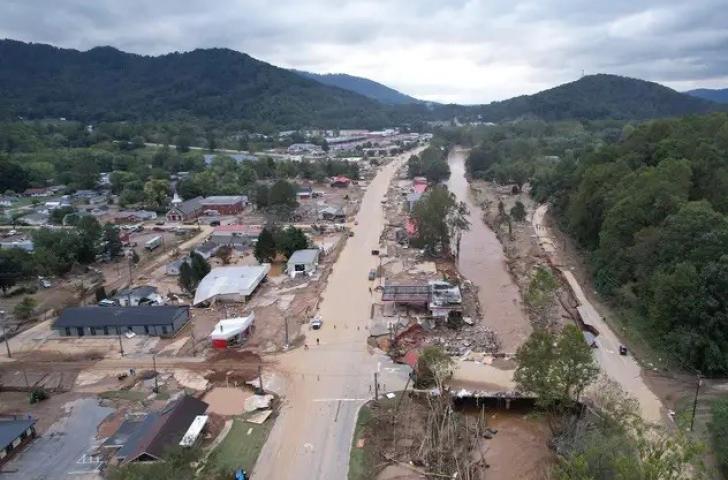 An aerial view of a city street in the aftermath of hurricane winds and flooding