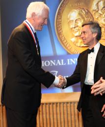 Garrett Brown with then-NIHF Selection Board Chairman Fred Allen and former Acting USPTO Director Theresa Stanek Rea at the National Inventors Hall of Fame Induction Ceremony