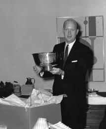 Directors Scientific Award 1959 - Karl Beyer Jr. holding silver bowl.